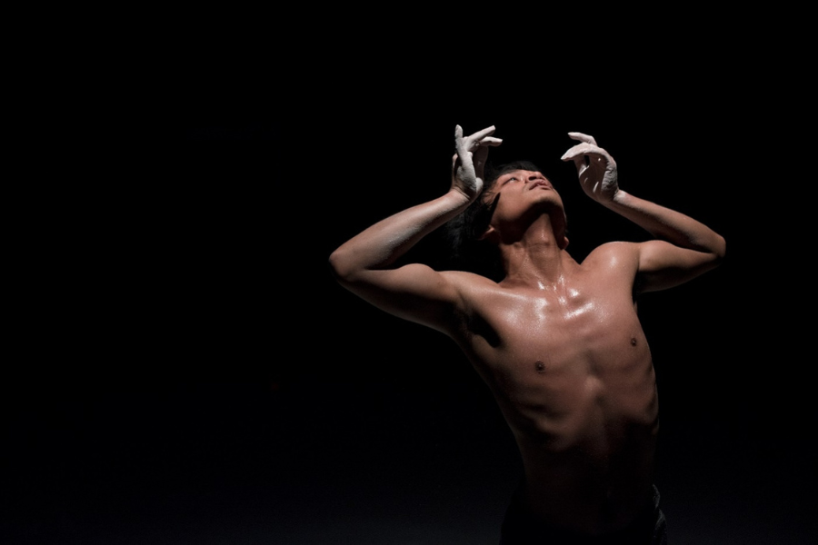 Rianto performs on stage