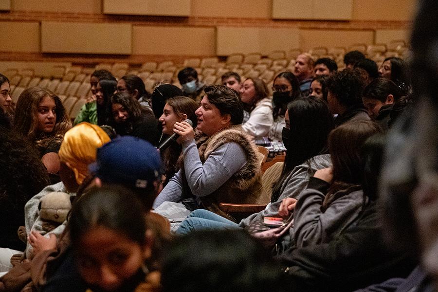 Students with microphone asking questions